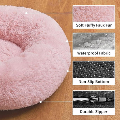 OhGeni Calming Donut Dog & Cat Bed Pillow, Machine Washable Plush Warming Bed, Anti-Slip Round Cuddle Comfort Pet Bed, Pillow Design Cozy Fluffy Faux Fur Bed for Small Medium Dogs, Pink, 23 inches