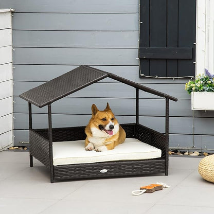 PawHut Wicker Dog House Outdoor with Canopy, Rattan Dog Bed with Water-Resistant Cushion, Raised Dog Bed for Small, Medium Dogs up to 66 lbs, 19.75" in Length, Brown Wicker, White Cushion